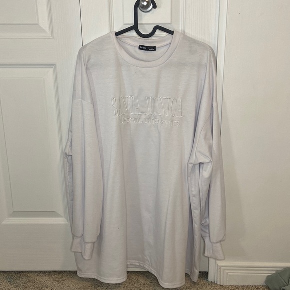 White sweater. - Picture 1 of 4